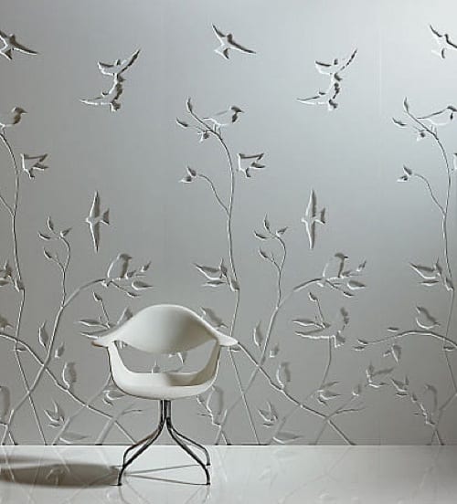 engraved wall panels with flowers and birds