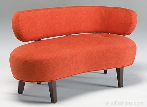 curved orange love seat