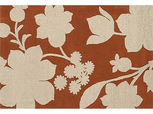 brown and cream area rug