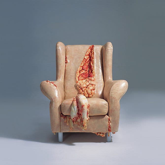 gruesome human parts armchair sculpture